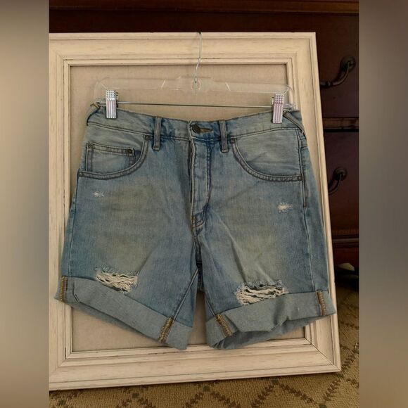 Free People distressed medium wash denim button fly cuffed shorts. 25 - Picture 1 of 12